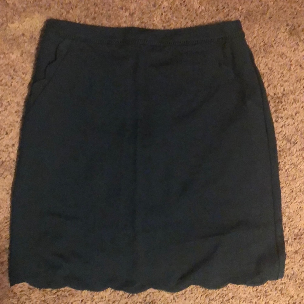 Skies are Blue dark green skirt.